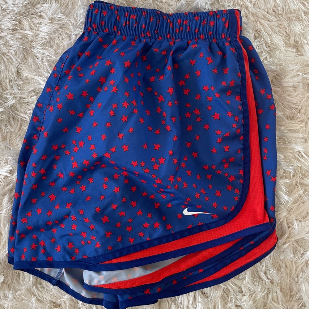 Nike Dri-Fit women’s star Lightweight running/workout shorts. Color: Red & Blue